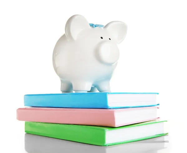 Piggy bank on books isolated — Stock Photo, Image