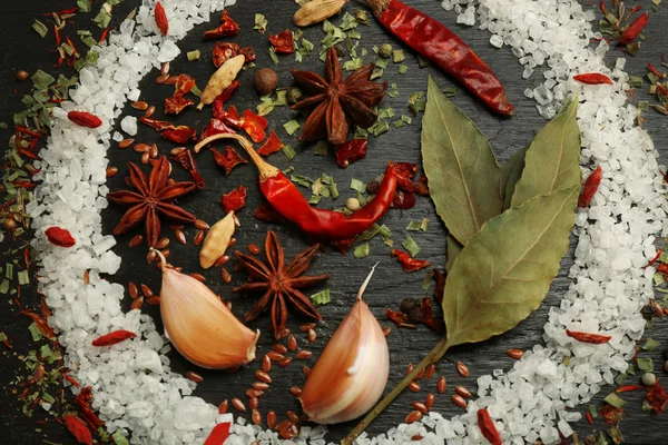 Different spices on wooden table, closeup — Stock Photo, Image