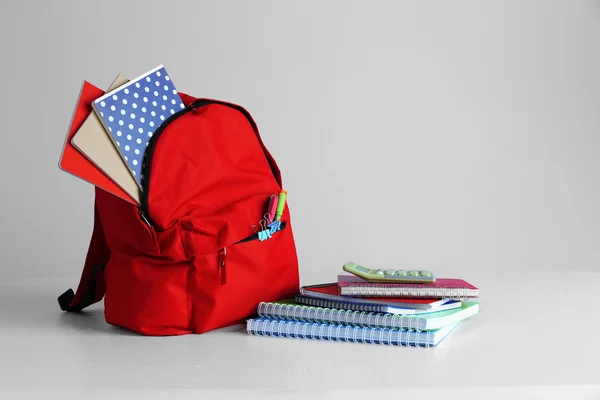 Backpack with school supplies — Stock Photo, Image