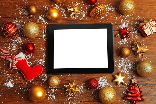 Tablet and Christmas decor — Stock Photo, Image