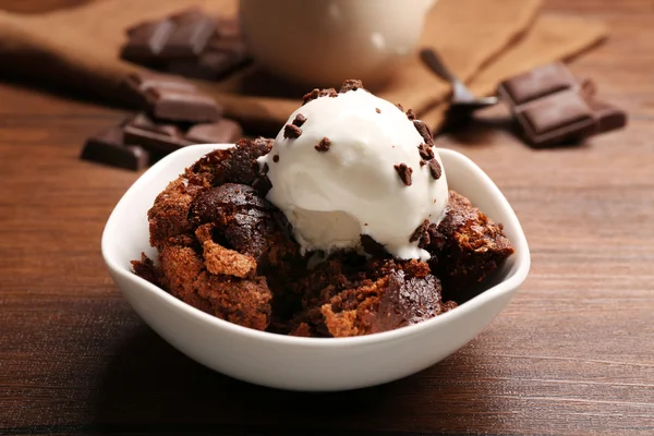 Served table of chocolate lava cake with ice-cream — Stock Photo, Image