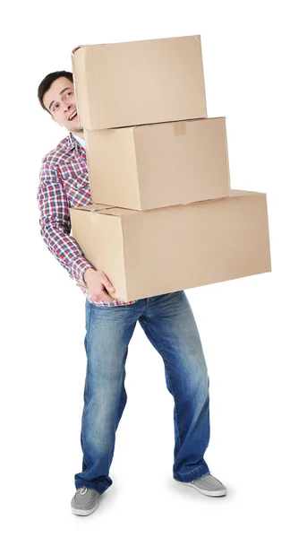 Hombre sosteniendo pila de cajas de cartón — Foto de Stock