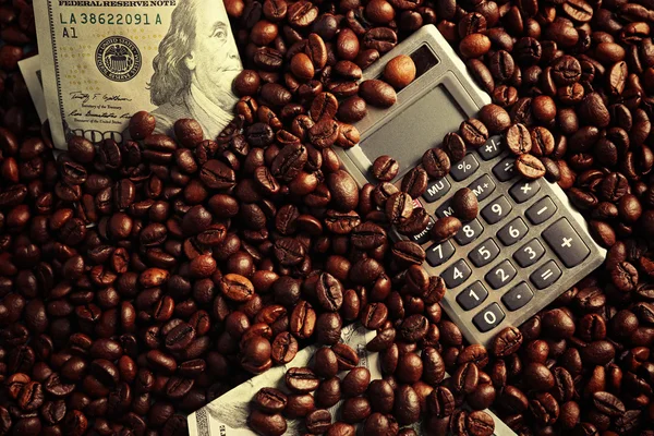 Coffee beans and dollar banknotes — Stock Photo, Image