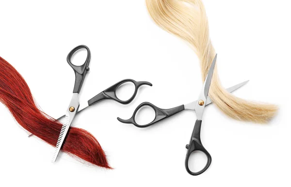Scissors with strands of hair — Stock Photo, Image