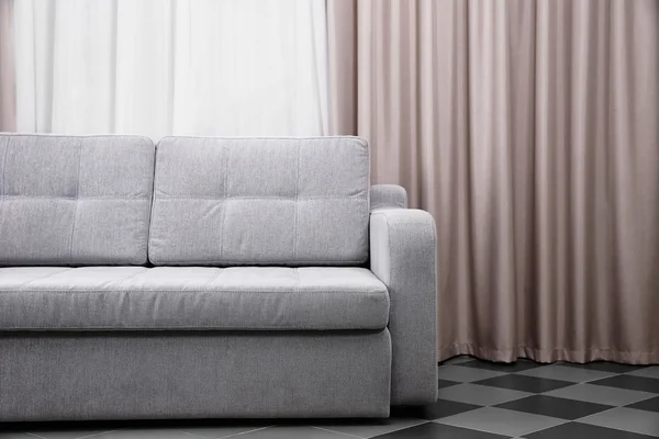 Grey sofa in the room — Stock Photo, Image