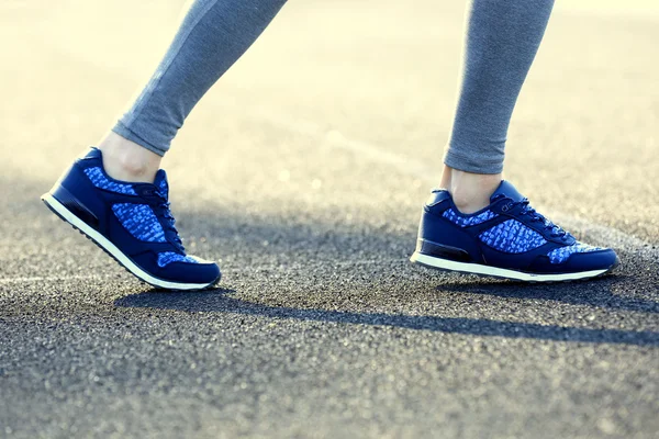 Legs in running movement — Stock Photo, Image