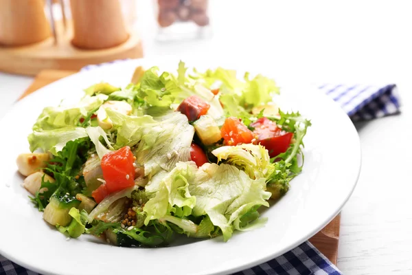Tasty salmon salad on wooden table background — Stock Photo, Image