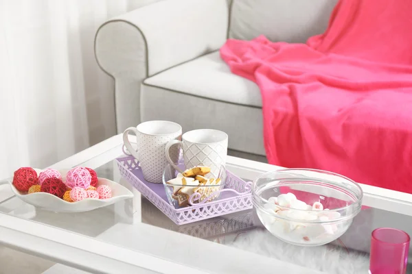 Low table with sweets — Stock Photo, Image