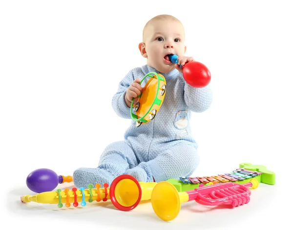 Adorable bebé con juguetes — Foto de Stock