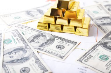 Altın külçelerini Doları banknot ile