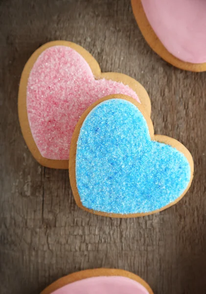 Kolorowe ciasteczka serce Valentine na drewniane tła — Zdjęcie stockowe