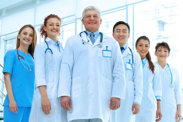 Team Smiling Doctors Indoors — Stock Photo, Image