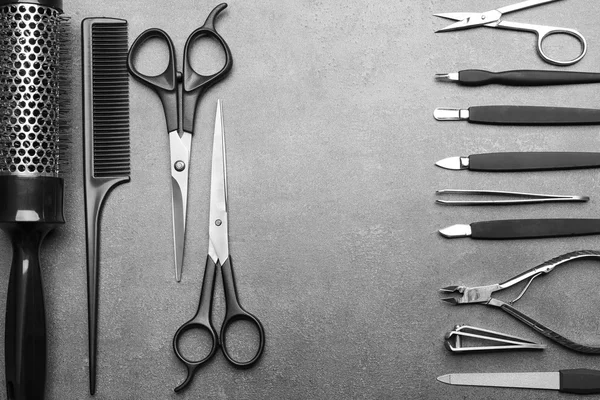 Barber and manicure set on grey background — Stock Photo, Image