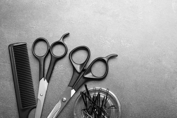 Barber set with tools on grey background — Stock Photo, Image