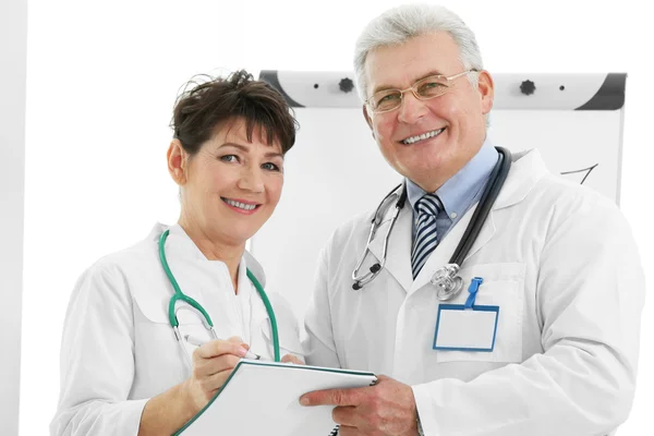 Adult doctors in office — Stock Photo, Image