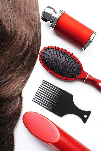 Barber set with strand of hair, tools and cosmetics, isolated on white — Stock Photo, Image