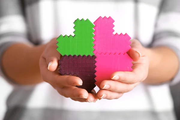 Cuori puzzle di plastica — Foto Stock