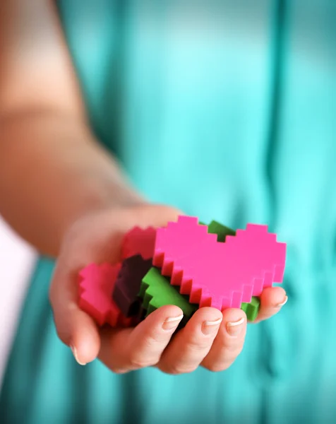 Puzzle z tworzywa sztucznego serca — Zdjęcie stockowe