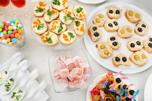 Set of cold snacks, canape and dessert, closeup — Stock Photo, Image