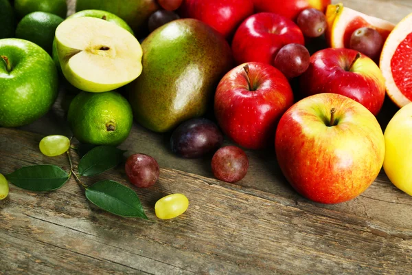 Fruits on wooden background Stock Photo