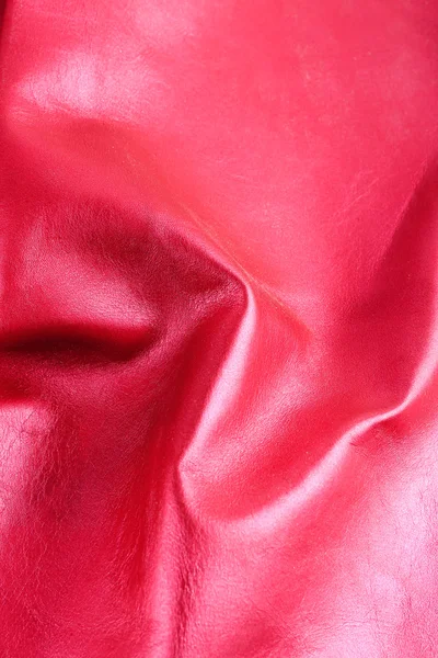 Red shiny leather texture close up — Stock Photo, Image