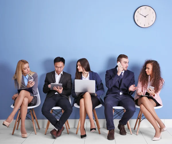 people sitting on chairs