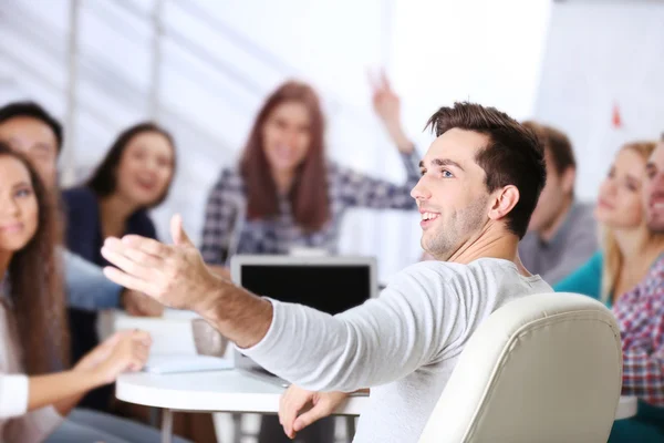 Young man sitting back — Stock Photo, Image