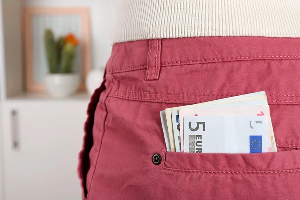 Money in the pink pocket, close up — Stock Photo, Image