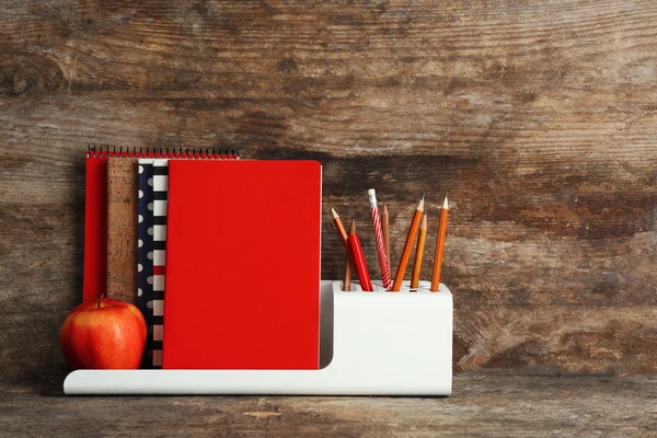 School supplies on old wooden table — Stock Photo, Image