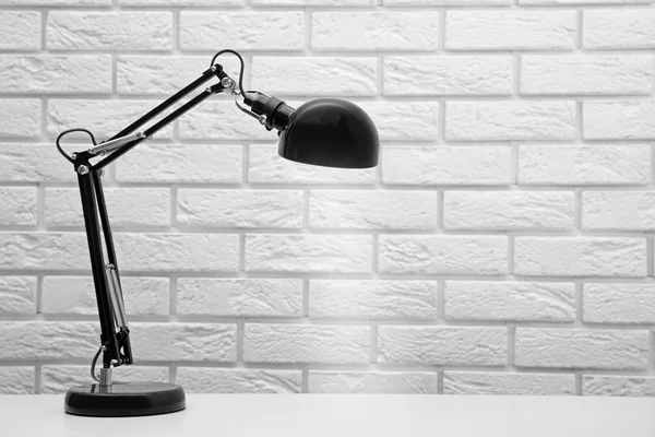 Lamp on the desk on white — Stock Photo, Image