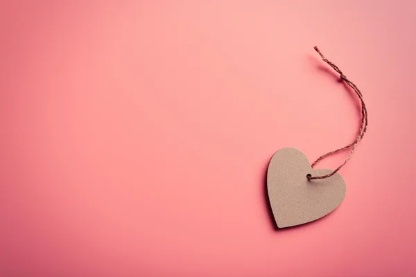 Valentines hjärta på rosa bakgrund — Stockfoto