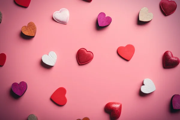 Valentines Hearts on pink background — Stock Photo, Image