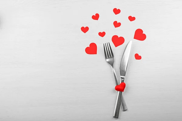 Fork and knife with hearts — Stock Photo, Image