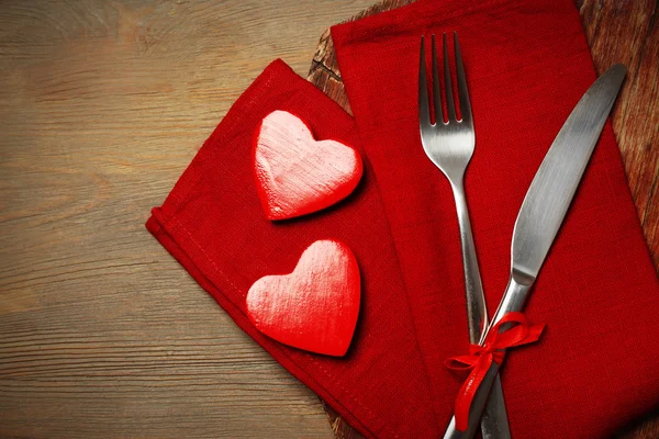 Composition of fork, knife, napkin — Stock Photo, Image