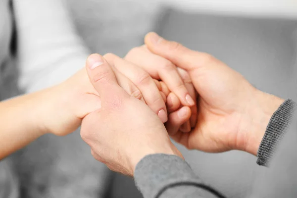 Man and woman holding hands closeup — Stock Photo, Image