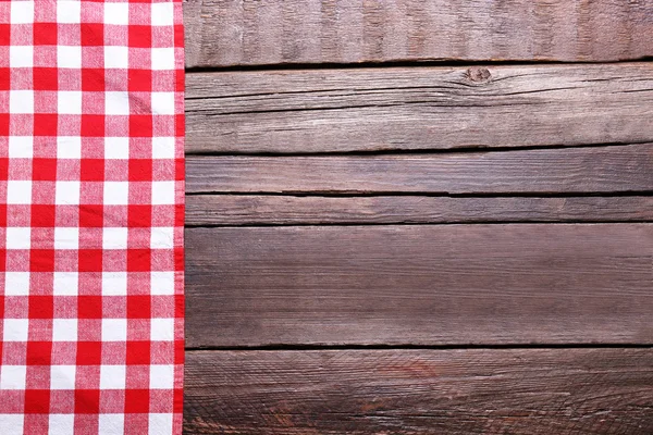 Tahta arka planda karalanmış peçete