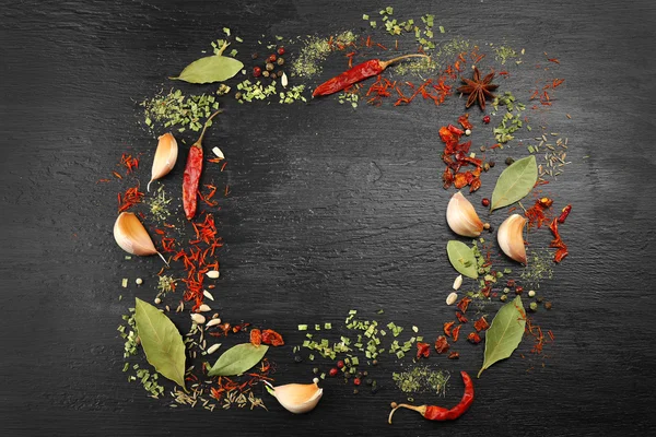 Spices frame on wooden table — Stock Photo, Image