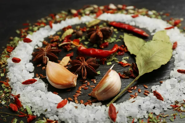 Different spices on wooden table, closeup — Stock Photo, Image