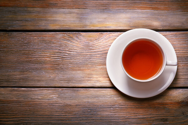 Cup of tea on wooden table