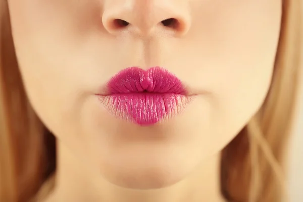 Sexy lips with heart shape paint — Stock Photo, Image