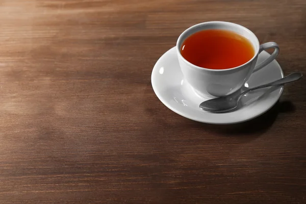 Cup of tea on wooden table — Stock Photo, Image