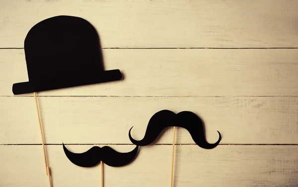 Paper hat and mustaches — Stock Photo, Image