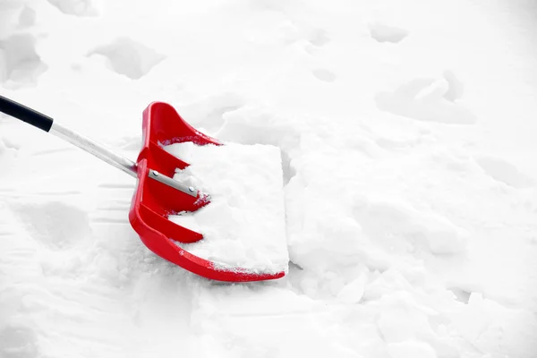 Red plastic shovel — Stock Photo, Image