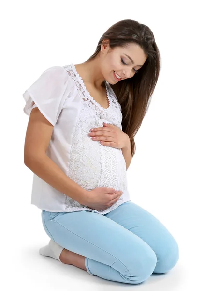 Bella donna incinta isolata su bianco — Foto Stock