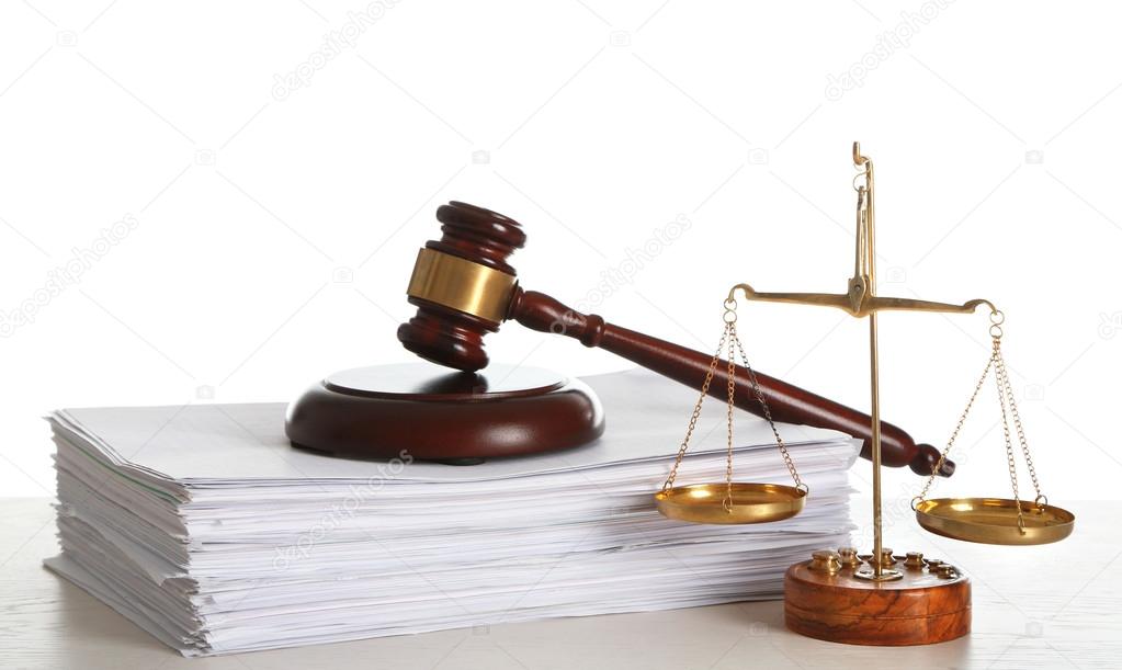 Wooden gavel with justice scales and stack of documents on white background