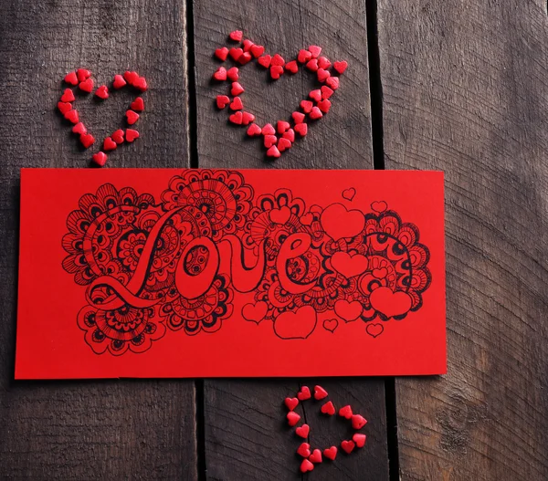 Cartão de presente vermelho com desenho doodle amor — Fotografia de Stock