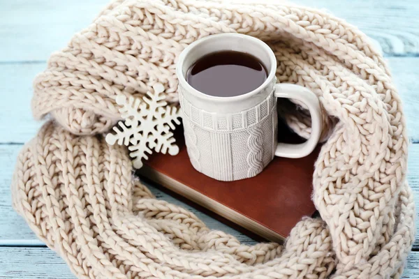 Beautiful winter composition with cup of hot drink, on wooden table — Stock Photo, Image