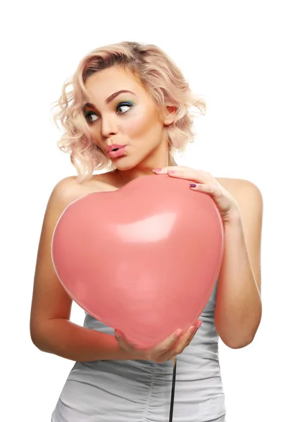 Chica sosteniendo globo del corazón —  Fotos de Stock