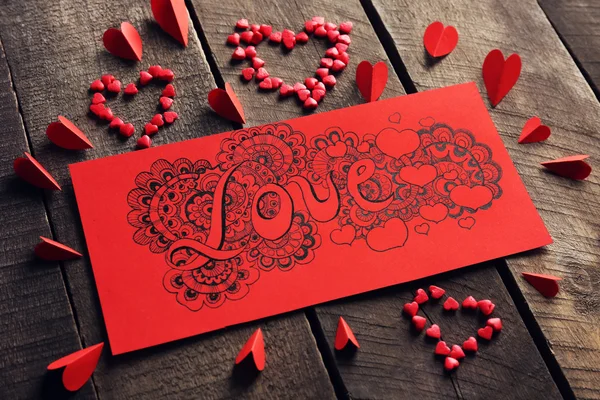 Red gift card with love drawing — Stock Photo, Image