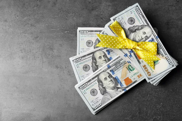 stock image Dollars and colorful bow